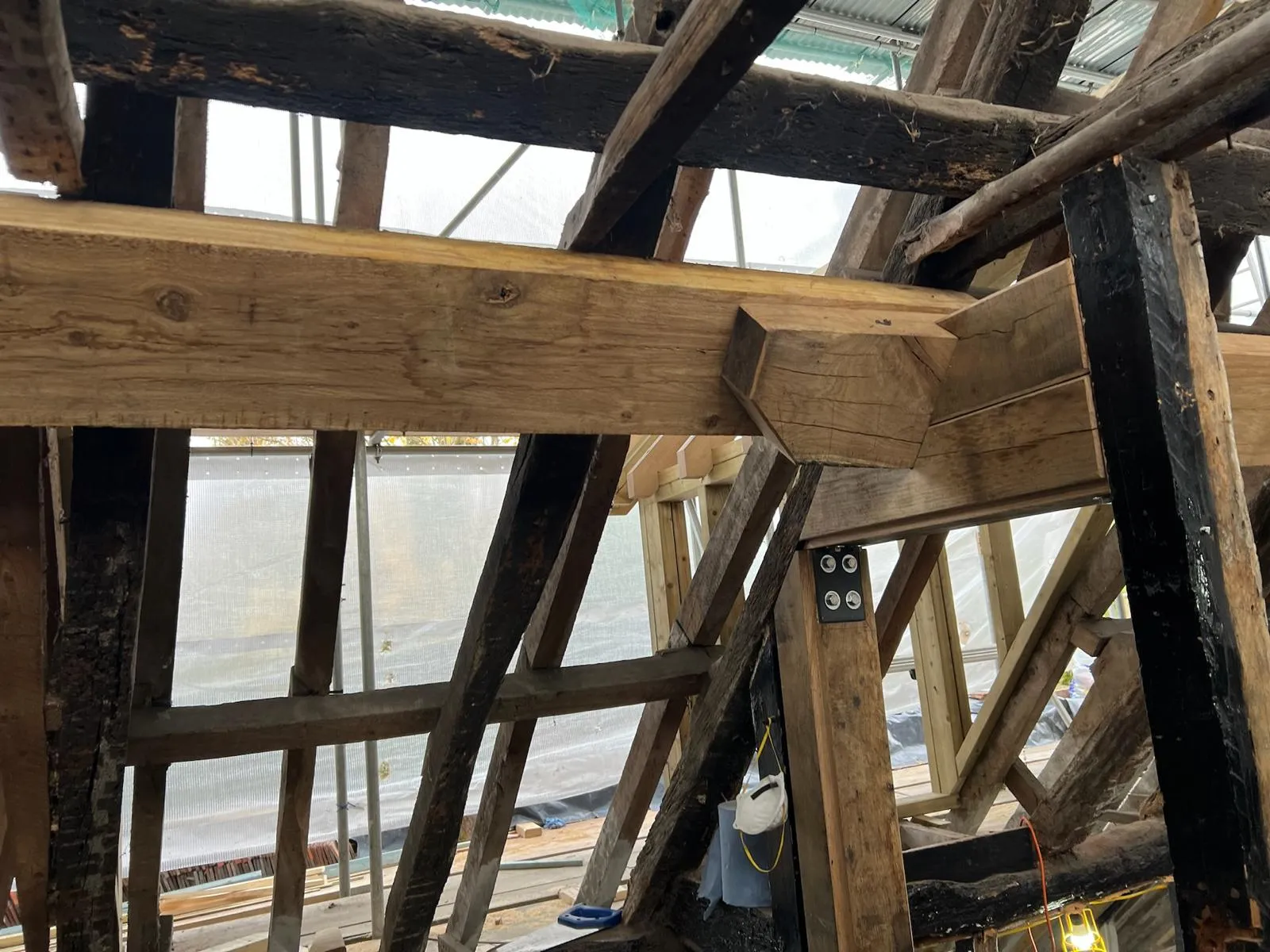 A view of a wooden structure with exposed beams.